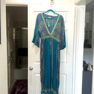 Earthbound trading company v-neck turquoise dress with mosaic design.